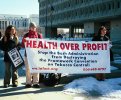 Banner reads: Health Over Profit! Stop the Bush Administration from Destroying the Framework Convention on Tobacco Control!